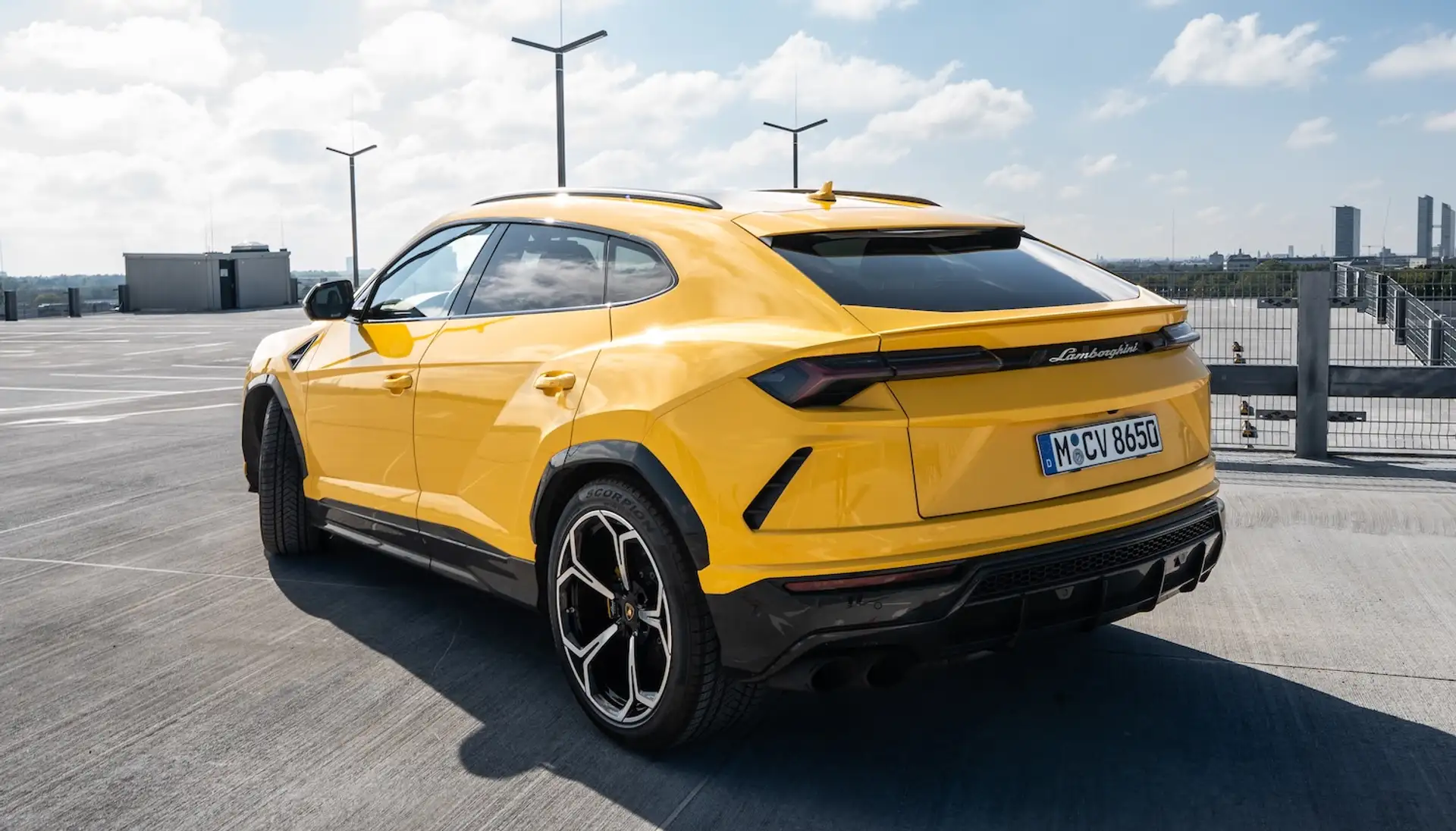 Lamborghini Urus in yellow rear view