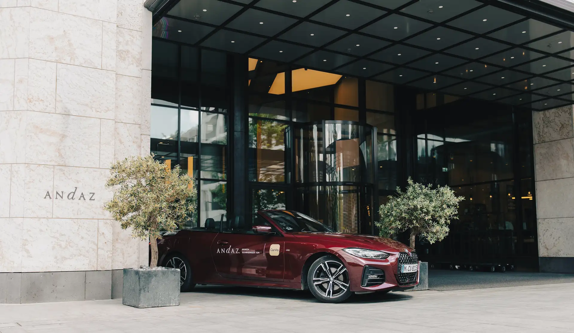 CarVia BMW 420i Convertible in front of the Andaz Hotel in Munich.