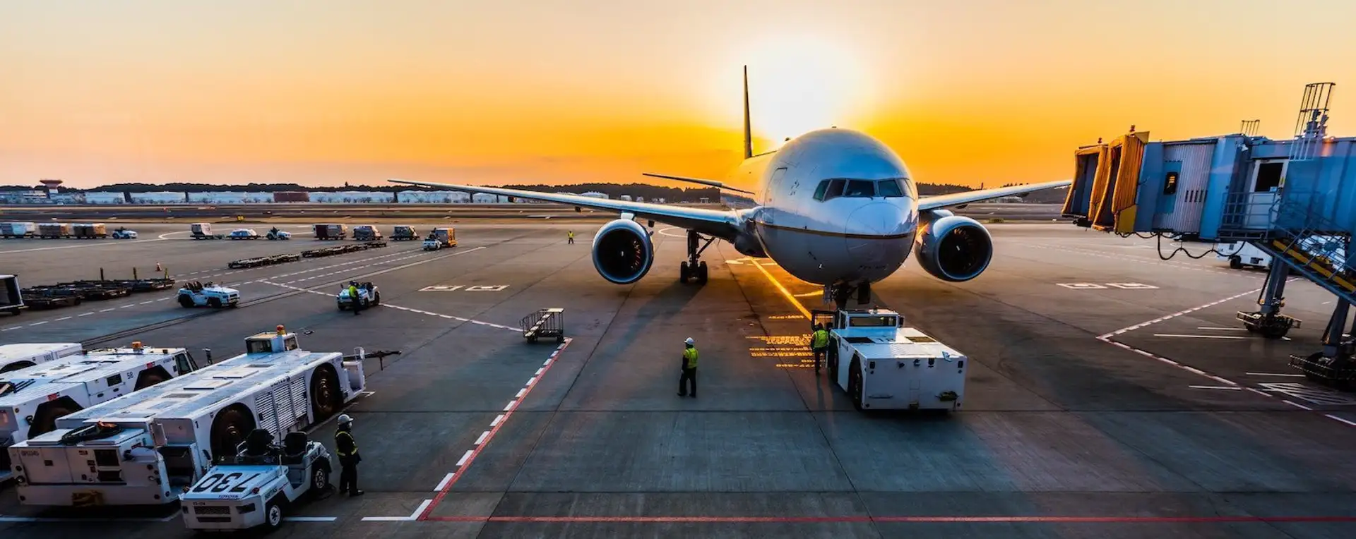 Airplane at Berlin Airport at sunset.